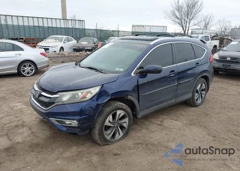 2016 Honda Cr-V Touring z USA, uszkodzony, nr VIN 5J6RM4H92GL032537